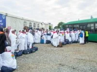 Hajj Pilgrims from Ghana boarding a bus